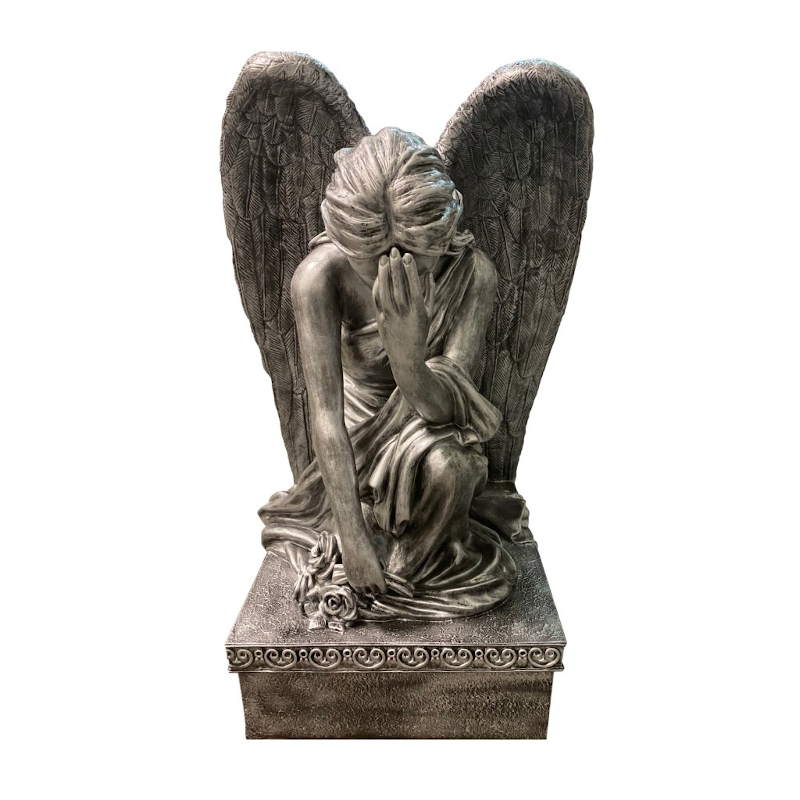 Rzeźba anioł klęczący