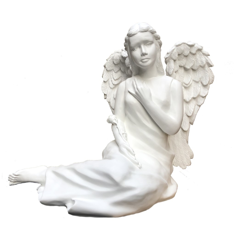Rzeźba anioła leżący
